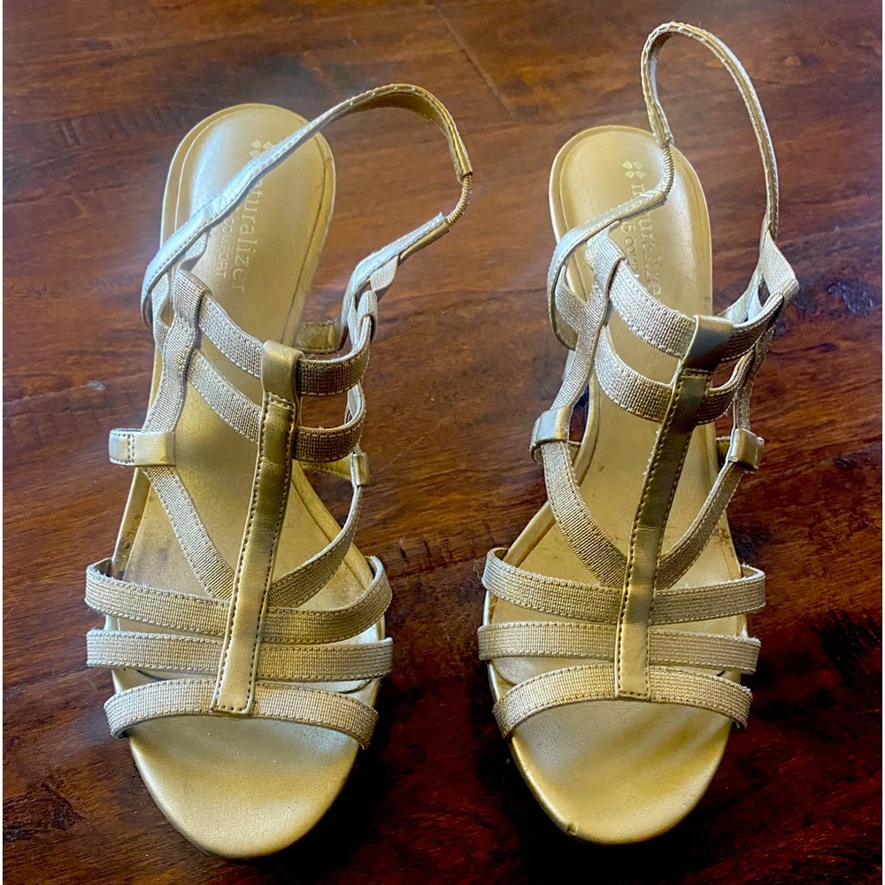 Gold strappy heel. Worn a few times but in good condition.